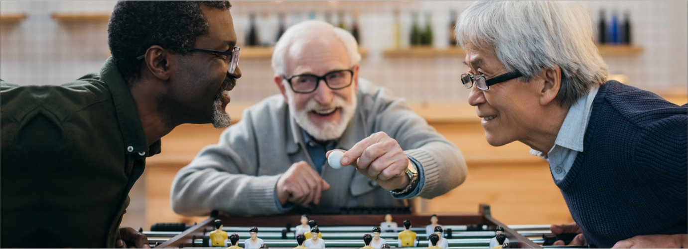 senior men playing board game