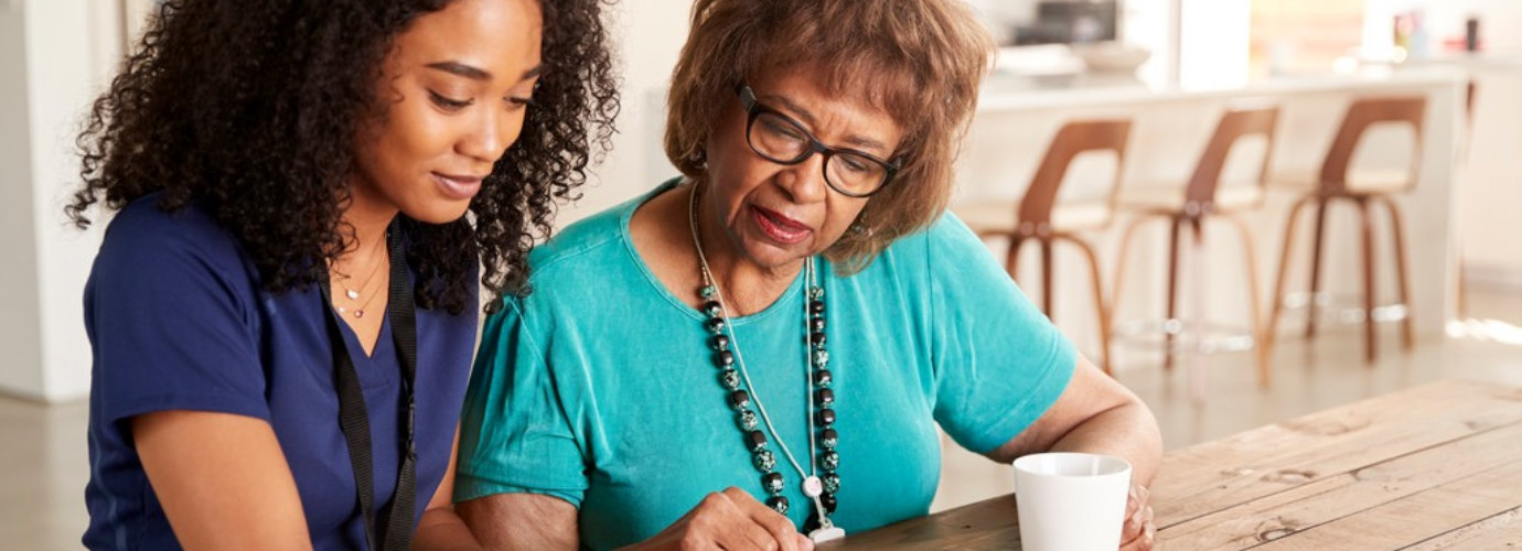 healthcare worker with a senior woman